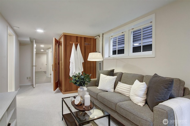 living room featuring light carpet