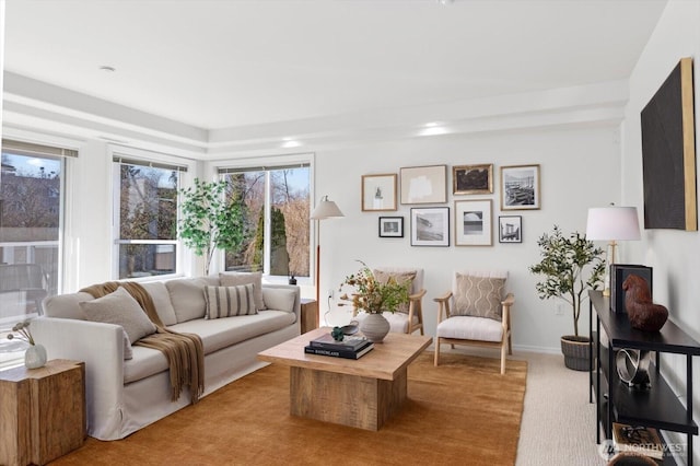 living room featuring light colored carpet