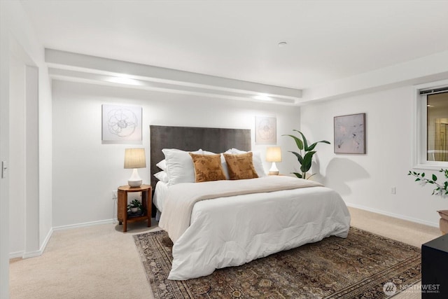 bedroom featuring light colored carpet