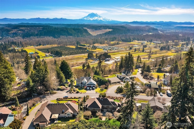 aerial view featuring a residential view and a mountain view