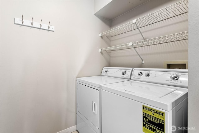 laundry area with independent washer and dryer