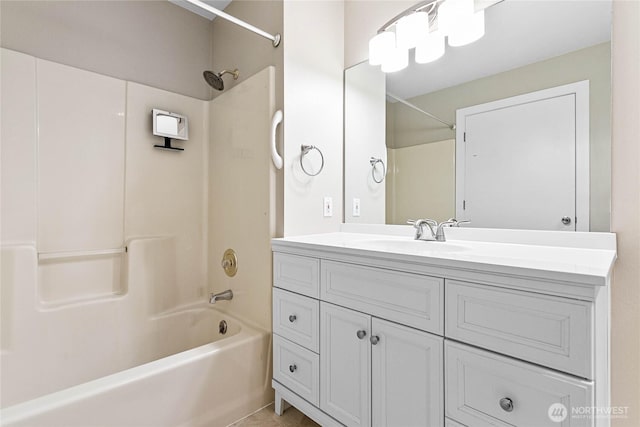 bathroom with vanity and bathtub / shower combination