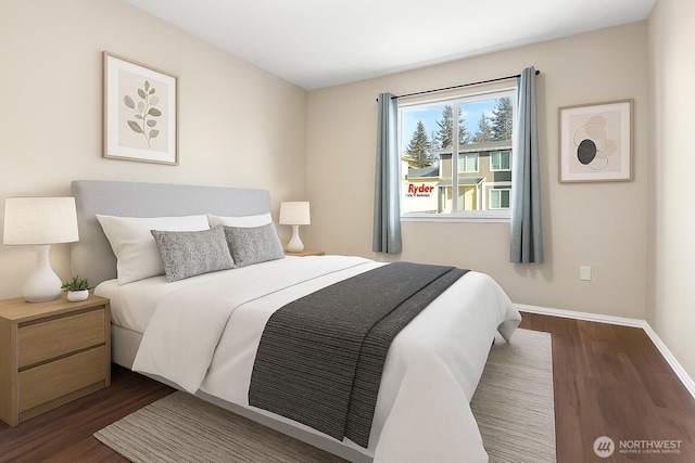 3350 NW Ave Unit 102, Bellingham, WA 98225 - bedroom featuring dark wood-style flooring and baseboards