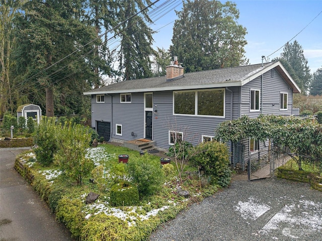 view of front of property featuring a garage