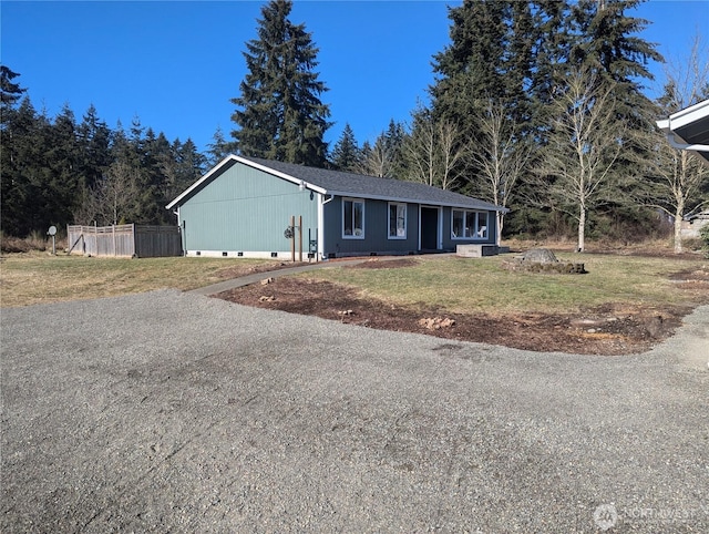 ranch-style house with a front yard