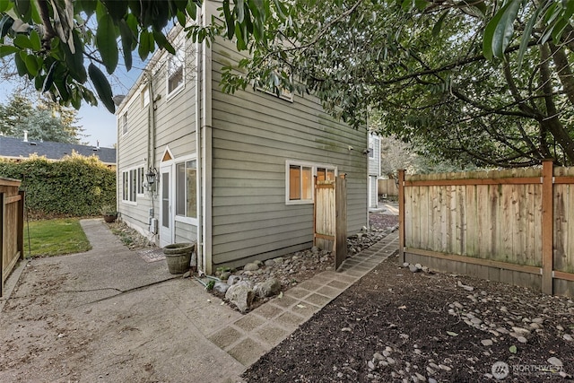 back of house featuring a patio area