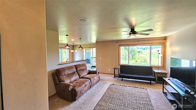 617 W Horton Way Unit 207, Bellingham, WA 98226 - carpeted living area featuring ceiling fan and baseboards