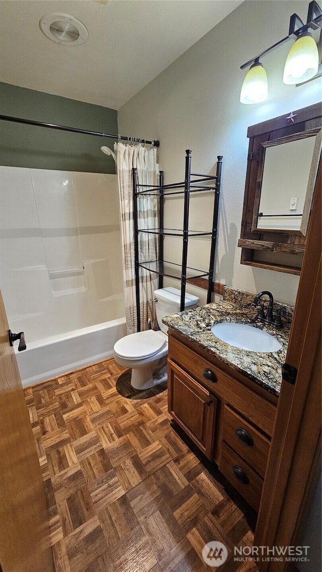 617 W Horton Way Unit 207, Bellingham, WA 98226 - bathroom featuring toilet, shower / bath combination with curtain, and vanity