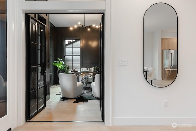 hall featuring light hardwood / wood-style floors