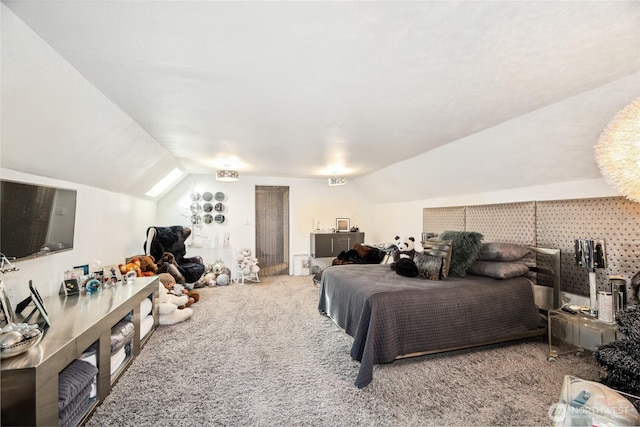 bedroom with lofted ceiling and carpet flooring