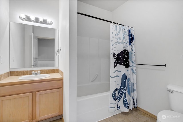 full bathroom featuring vanity, shower / tub combo, and toilet