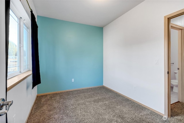 view of carpeted spare room