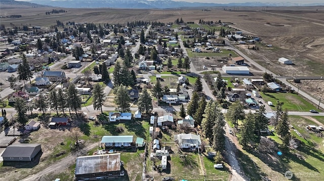 aerial view featuring a mountain view and a residential view