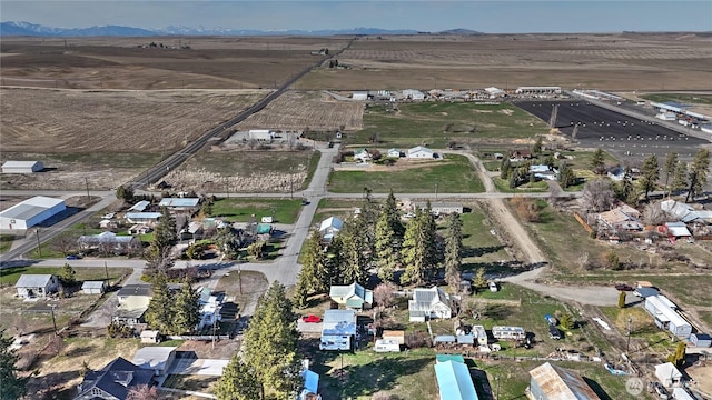 drone / aerial view with a rural view and a mountain view