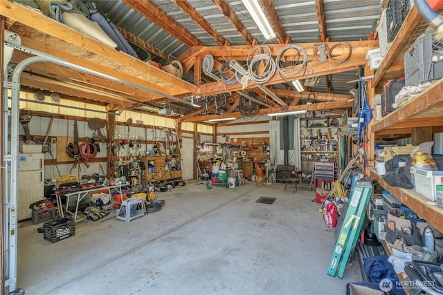 garage with a workshop area
