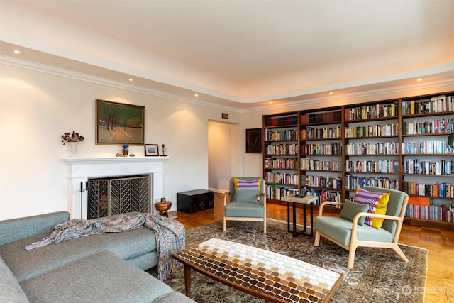 living area with ornamental molding