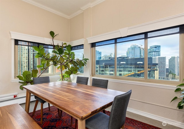 dining room featuring crown molding