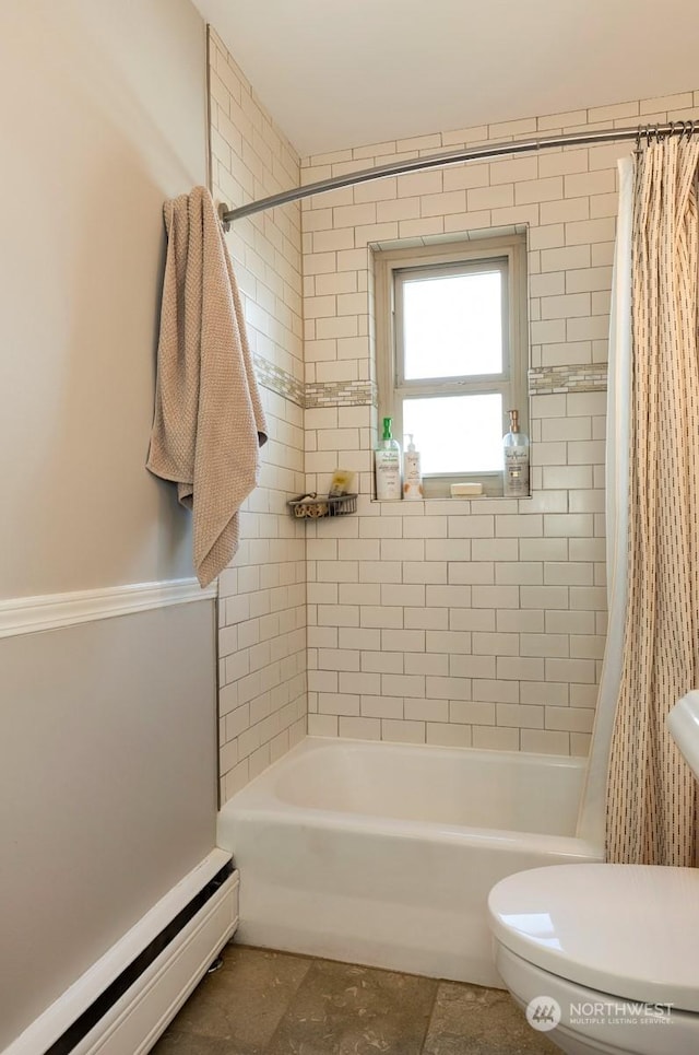 bathroom featuring shower / tub combo, a baseboard heating unit, and toilet