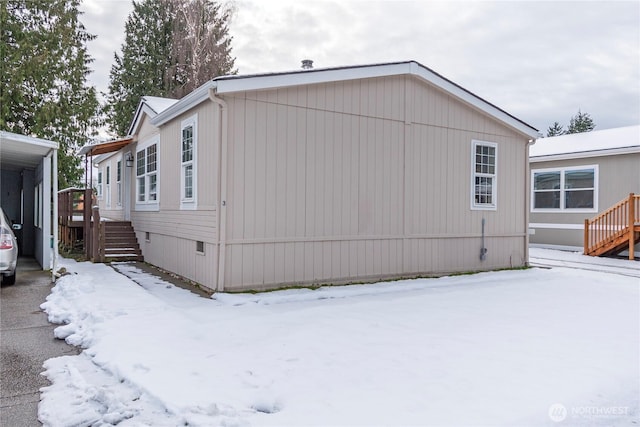 view of snow covered property