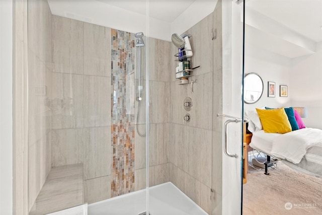 full bath featuring a tile shower