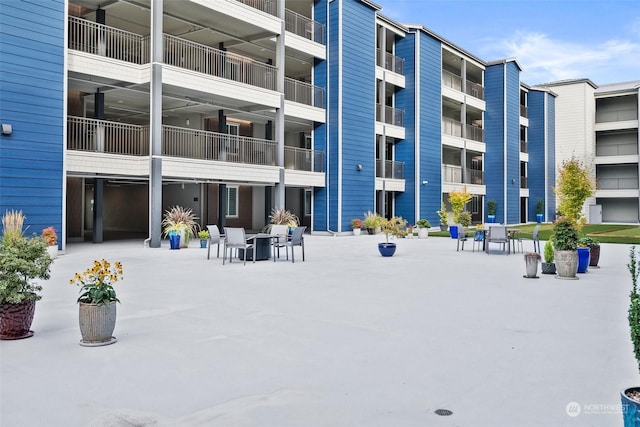 view of home's community featuring a patio area