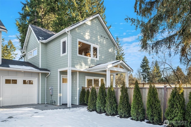 view of front of property with a garage