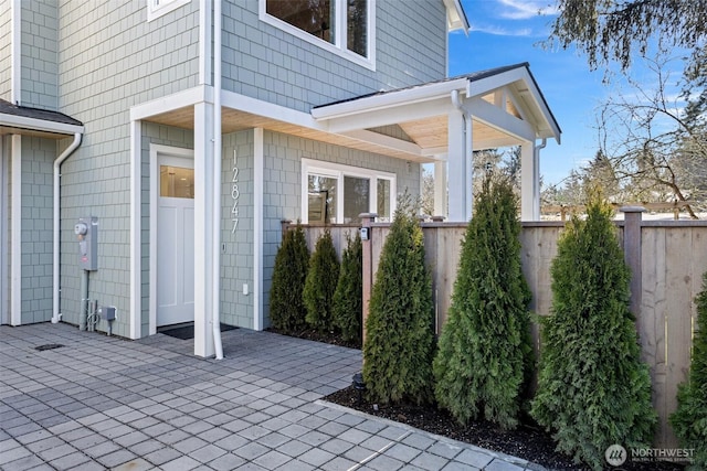 view of patio / terrace featuring fence