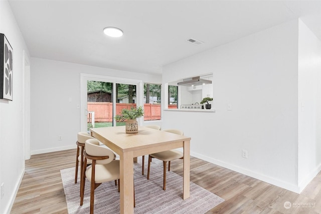 dining area featuring light hardwood / wood-style flooring