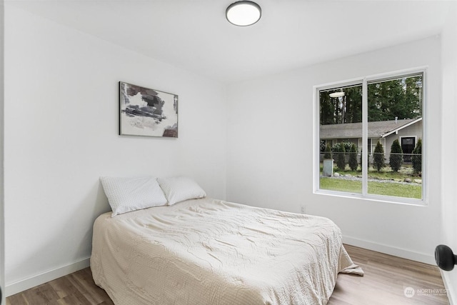 bedroom featuring hardwood / wood-style floors