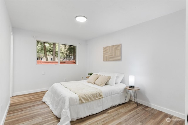 bedroom featuring light wood-type flooring