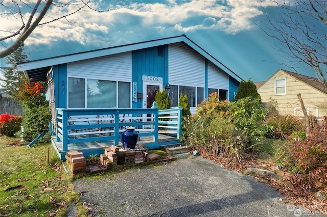 view of front of house with a deck