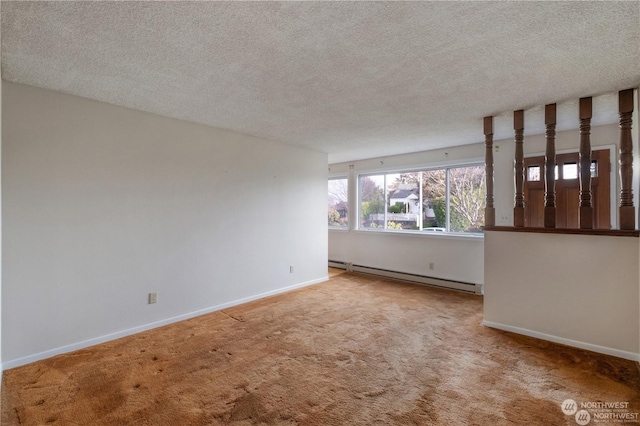 carpeted spare room featuring a baseboard radiator and a textured ceiling