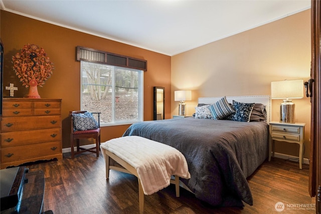 bedroom featuring dark hardwood / wood-style flooring