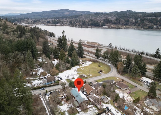 bird's eye view featuring a water and mountain view