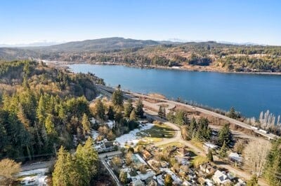 birds eye view of property featuring a water view