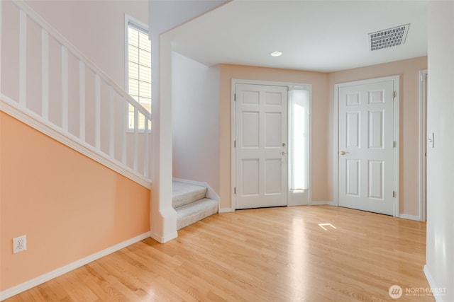 entrance foyer featuring light hardwood / wood-style floors