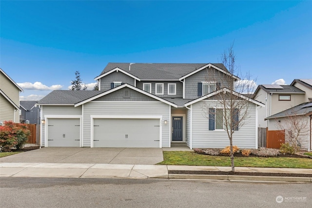 craftsman house with a garage