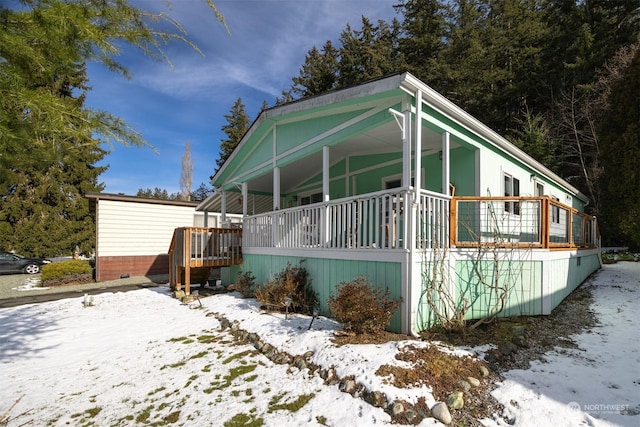 view of snow covered property