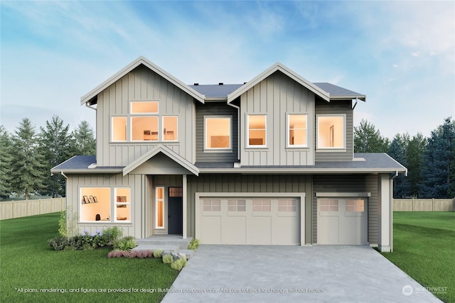 view of front of house featuring a garage and a front yard