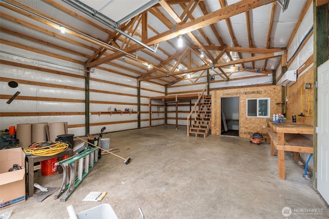 garage featuring a wall mounted AC