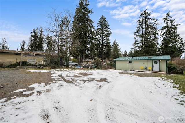 view of yard covered in snow