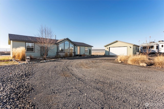 single story home featuring a garage