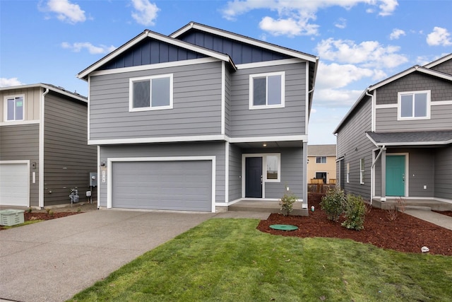 view of front of house featuring a garage and a front lawn