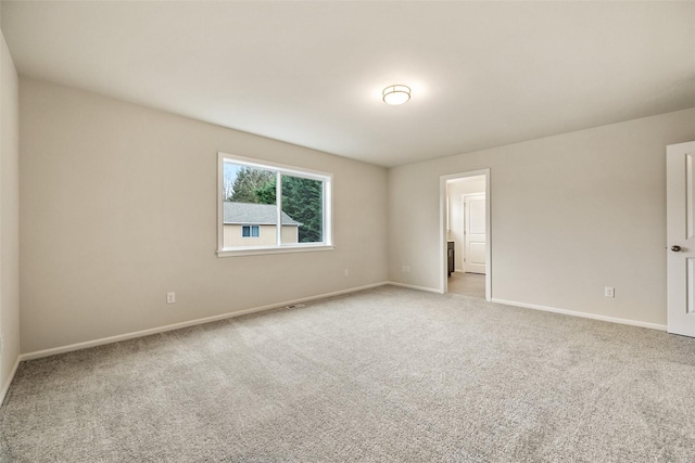 view of carpeted spare room