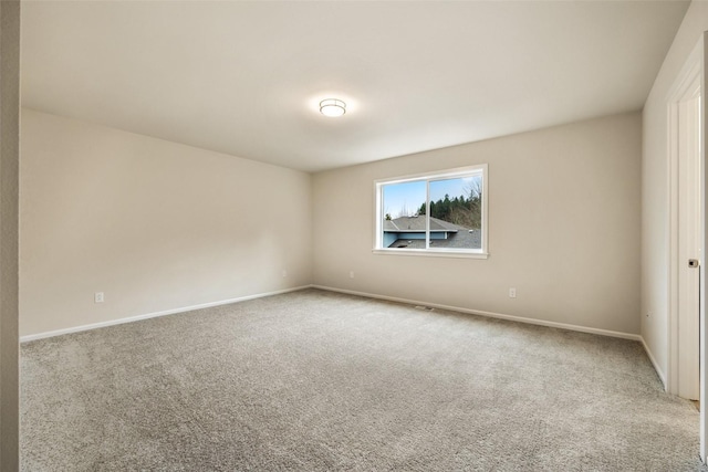 view of carpeted spare room