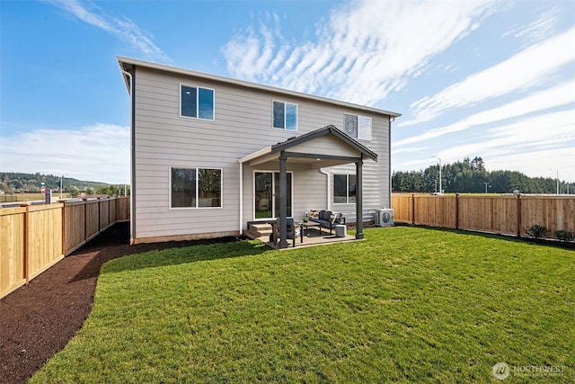 287 Wind River Ct, Chehalis, WA 98532 - rear view of house featuring a yard, a patio, and a fenced backyard