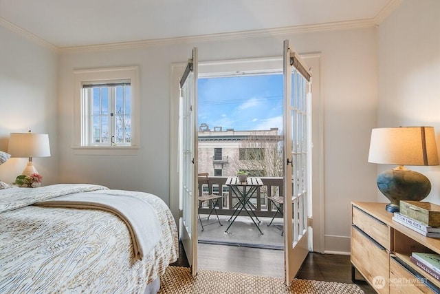 bedroom with crown molding, baseboards, and dark wood-type flooring