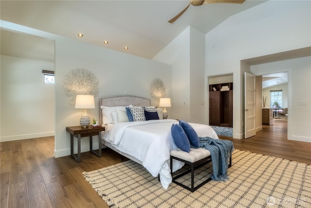 bedroom with dark wood-type flooring, recessed lighting, and baseboards