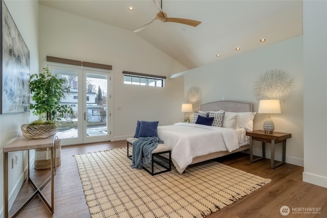 bedroom with baseboards, wood finished floors, access to exterior, high vaulted ceiling, and recessed lighting