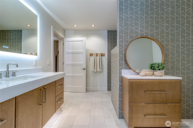 full bathroom with tile patterned flooring, vanity, and recessed lighting